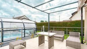 Villas Villa confortable a Ranville, piscine privee : photos des chambres