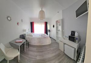 Maisons de vacances Les gites du Pavachon au porte du Puy duFou : photos des chambres