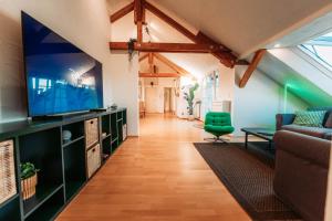 Spacious Penthouse with AC and Free Parking Steps Away From the Central Station