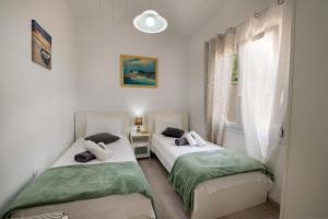 Loggos Seaview Cottage with Private Pool by Konnect