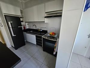 Encantador - Pé na Areia - WiFi - Serviço Praia - Guarujá - SP