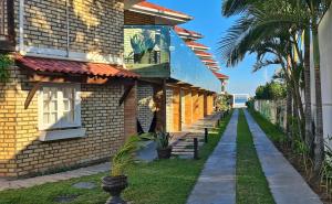 Pousada Recanto Edênico - à beira mar da Praia Ponta do Papagaio, Palhoça SC