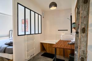 Appartements Le Refuge - Les Demeures d-Adrien : photos des chambres