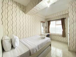 Best Price Studio Apartment at Easton Park Residence Jatinangor By Travelio