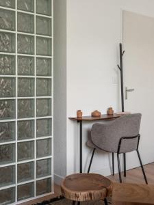 Appartements L-Hotel de JC - CHU : photos des chambres