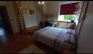 Karininko namas ir sodas miesto centre