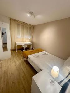 Appartements Au Coeur du Quartier Taittinger : photos des chambres