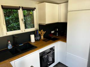 Tiny house avec jardin clos et privatif proche Disneyland et parc des félins