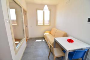 Home 8 nel Boomerang Village a Torre Colimena