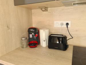 Appartements Le Nid du Bosquet : photos des chambres