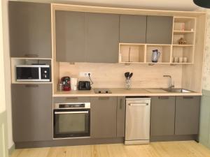 Appartements Le Nid du Bosquet : photos des chambres