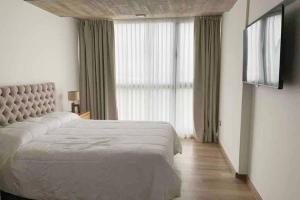 Precioso Departamento Frente al Mar para 1-4 Personas