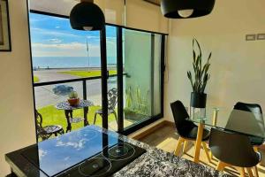 Precioso Departamento Frente al Mar para 1-4 Personas