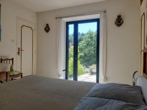 Sejours chez l'habitant Chambre et terrasse dans une ancienne bergerie : photos des chambres