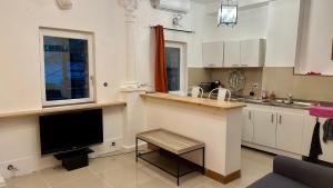 Appartements Charmant appartement au calme sur jardin : photos des chambres