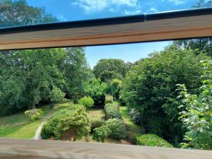 Le 105 - appart-sympa - T2 vue jardin et cave - Larmor-Plage
