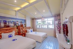 Zhoujia Hostel - 2hvězdičkové hotely ve městě Čang-ťia-ťie