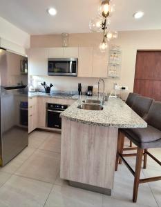 Condominio Ámbar Espectacular Área de Alberca a 100 mts playa