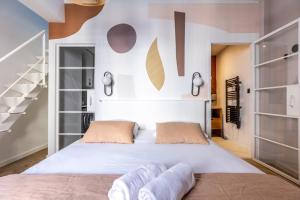 Appartements Arty by PRIM0 C0NCIERGERIE : photos des chambres