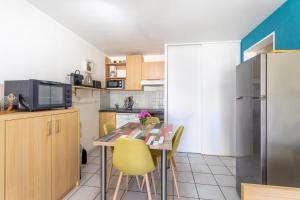 Appartements Appartement aux Aloes : photos des chambres