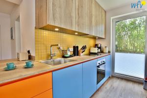 Haus am Dorfbrunnen Ferienwohnung Welle