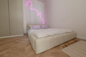 Appartements L Envole - Jacuzzi - Proche Gare et Centre ville : photos des chambres