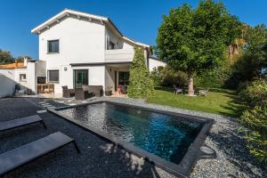 Villas 1ere ligne sur le golf piscine, clim, barbecue : photos des chambres