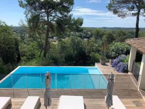 Villas Calme et confort dans un ecrin de verdure : photos des chambres