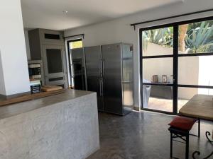 Villas Calme et confort dans un ecrin de verdure : photos des chambres