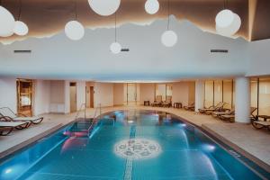 Österreichischer Hof-im Bademantel direkt in die Alpentherme