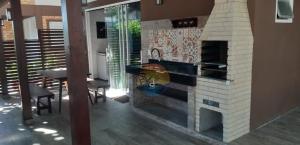 Linda Casa com 03 Dormitórios - 30 Metros até até a Praia