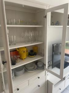 Bajo con jardín en primera línea de playa