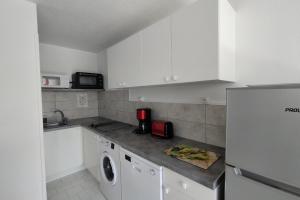 Appartements The cozy place on the port and the beach : photos des chambres