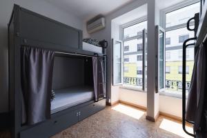 Bed in 8-Bed Mixed Dormitory Room room in Hub Lisbon Patio Hostel