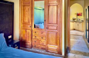 Palmeraie vue piscine 3 exclusivement aux familles