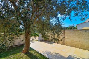 Villa Mina con Jacuzzi nel Boomerang Village a Torre Colimena