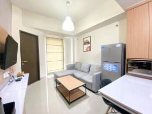 Exclusive and Comfortable 1BR Apartment Mustika Golf Residence By Travelio