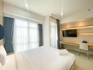 Good Deal and Elegant Studio Vasanta Innopark Apartment By Travelio