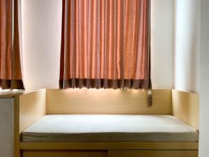 Relaxing Studio at Patraland Urbano Apartment By Travelio