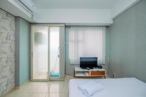 Comfy Studio Apartment at Margonda Residence 3 By Travelio