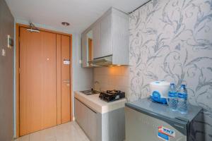 Comfy Studio Apartment at Margonda Residence 3 By Travelio