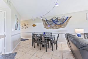 Undersea Retreat: Coastal Charm Walk to Beach Access with Amenities Galore OW4-406