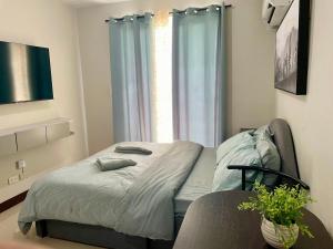 Near Beach Condo with 2 Olympic Size Pool