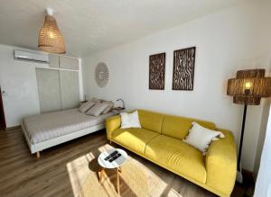 Appartements Pieds dans l-eau, sur une plage : photos des chambres