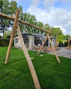 Holiday house with private SAUNA and HOTTUB on park de Ijsvogel with swimming pools and children entertaiment AIRCO