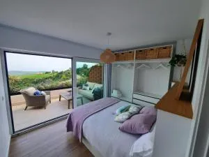 Vistas al mar y con jardín - Casa Abelia - Udias
