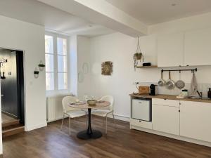 Appartements Les Loges des Coteaux - Loge 1 - Luxury lodges with jacuzzi : photos des chambres