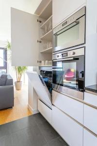 Appartements Comfortion Mirage - appartement de luxe avec vue sur la Tour Eiffel et Paris : photos des chambres