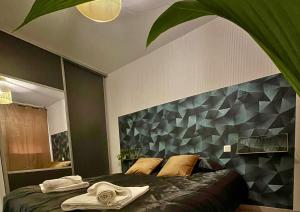 Appartements Le Jungle - Parking et wifi gratuit - Balcon - Alexa : photos des chambres