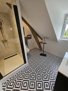 Appartements GITE Le Parisien Appartement prive en Duplex avec acces jacuzzi a 10min des plages : photos des chambres
